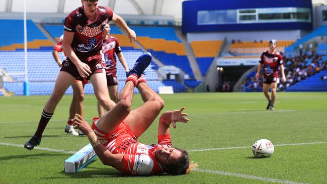 17th October 2020, Currumbin Eagles player Tylee Donovan takes a dramatic aerial dive to score in the corner during the Gold Coast Rugby League Under 18Ã•s Grand Final against the Burleigh Bears played at CBus Stadium Photo: Scott Powick Newscorp