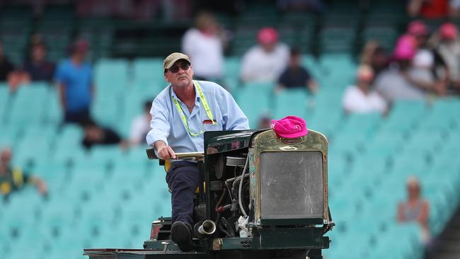 SCG Head groundsman Tom Parker rolling the pitch. There have been concerns raised about the playing surface of the venue, forcing the relocation of a Sheffield Shield game this week. Picture. Phil Hillyard