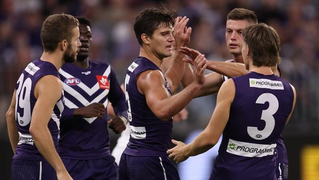 PERTH, AUSTRALIA – APRIL 23: Lachie Schultz of the Dockers celebrates a goal during the round six AFL match between the Fremantle Dockers and the Carlton Blues at Optus Stadium on April 23, 2022 in Perth, Australia. (Photo by Paul Kane/Getty Images)