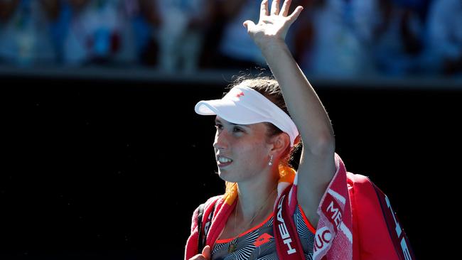 Elise Mertens waves goodbye to the Melbourne crowd. Picture: AFP Photo