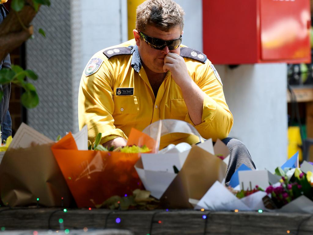 A Horsley Park RFS members is seen at a memorial for firefighters. Picture: Bianca De Marchi/AAP