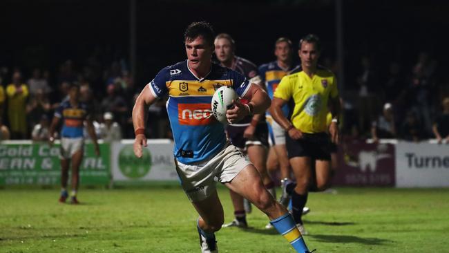 Gold Coast Titans' Beau Fermor carries the ball during a pre-season trial against Burleigh Bears at Pizzey Park. February 20, 2021. Photo Jason O'Brien