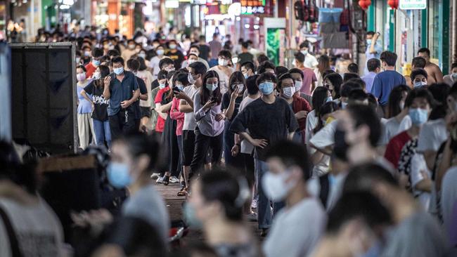 Residents queue for Covid-19 tests in Guangzhou, in China’s southern Guangdong province. Picture: AFP