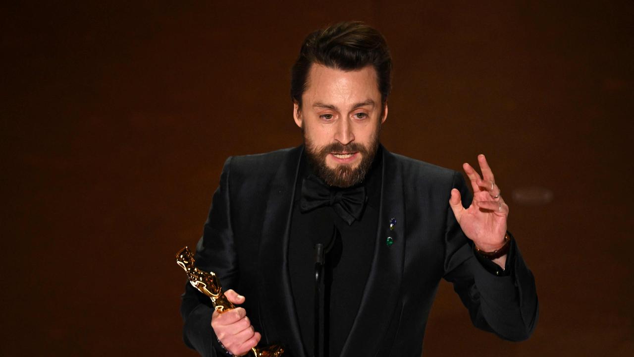 Kieran Culkin accepts the award for outstanding performance by a male actor in a supporting role for ‘A Real Pain’. Picture: Patrick T. Fallon / AFP