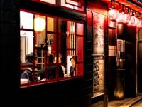 Kyoto, Japan - April 16, 2019: People sitting eating food inside restaurant through window on Pontocho alley street at night with lanterns and izakaya nightlifeEscape 29 October 202348yrs - KyotoPhoto - iStock