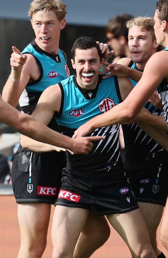 Josh Sinn (Centre) is entering the final year of his deal. Picture: James Elsby/AFL Photos via Getty Images