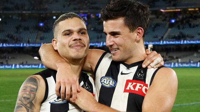 MELBOURNE, AUSTRALIA - JUNE 16: Bobby Hill of the Magpies and Nick Daicos of the Magpies celebrate during the 2024 AFL Round 14 match between the North Melbourne Kangaroos and the Collingwood Magpies at Marvel Stadium on June 16, 2024 in Melbourne, Australia. (Photo by Michael Willson/AFL Photos via Getty Images)