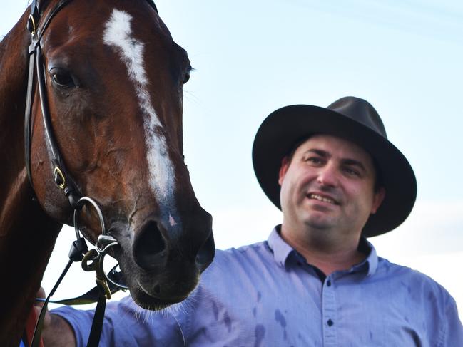 Queen of Kingston with trainer Daniel Bowen after it won the Beef Week Cup at Casino. The horse died after a race at Brisbane on the weekend. Photo Susanna Freymark