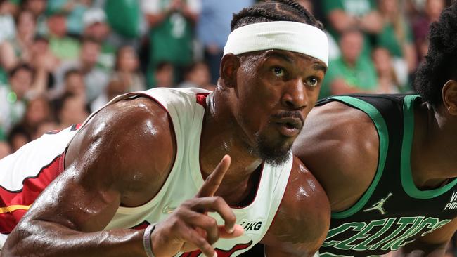 BOSTON, MA - MAY 27: Jimmy Butler #22 of the Miami Heat and Aaron Nesmith #26 of the Boston Celtics look on during Game 6 of the 2022 NBA Playoffs Eastern Conference Finals on May 27, 2022 at the TD Garden in Boston, Massachusetts.  NOTE TO USER: User expressly acknowledges and agrees that, by downloading and or using this photograph, User is consenting to the terms and conditions of the Getty Images License Agreement. Mandatory Copyright Notice: Copyright 2022 NBAE  (Photo by Nathaniel S. Butler/NBAE via Getty Images)