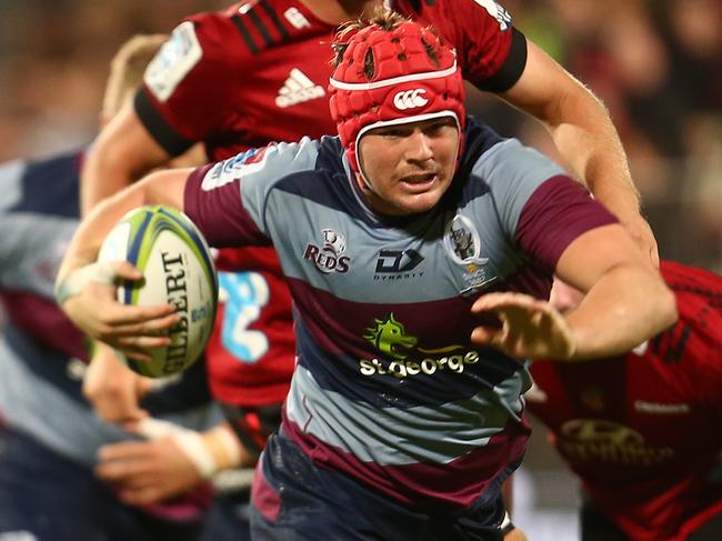 CHRISTCHURCH, NEW ZEALAND - MARCH 06: Harry Wilson of the Reds makes a break during the round six Super Rugby match between the Crusaders and the Reds at Orangetheory Stadium on March 06, 2020 in Christchurch, New Zealand. (Photo by Teaukura Moetaua/Getty Images)