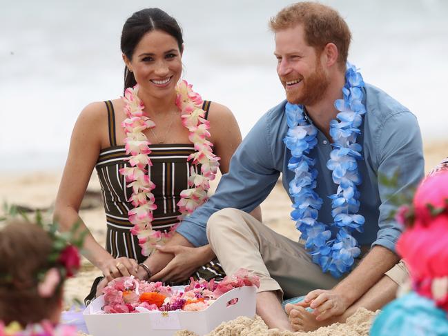 Prince Harry and Meghan Markle at Bondi Beach in 2018. The couple are looking for a more relaxed lifestyle in California. Picture: Getty Images