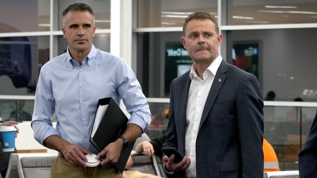 Premier Peter Malinauskas and Treasurer Stephen Mullighan await an early-morning flight to Whyalla on Tuesday. Picture: NewsWire / Dean Martin