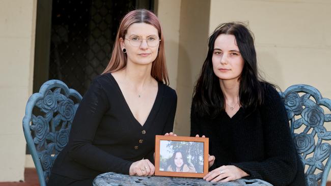 Kimmi Smith and Shen Bell with a photo of Synamin Bell. Picture: Frank Monger