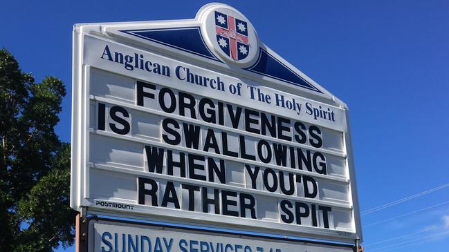 The sign outside the Anglican Church of The Holy Spirit at Surfers Paradise has locals screaming “CAN I GET AN AMEN!”. Photo: John-Paul Langbroek.