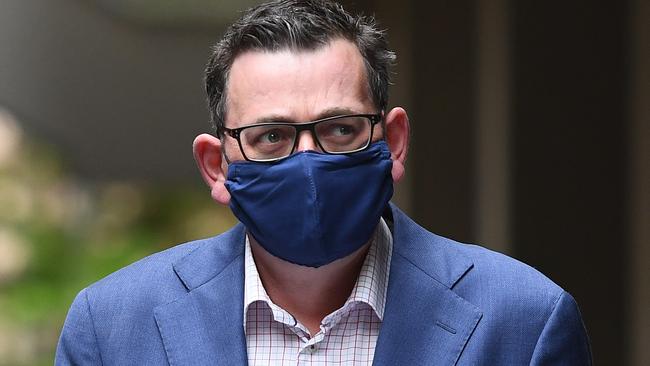 Victorian Premier Daniel Andrews wears a face mask