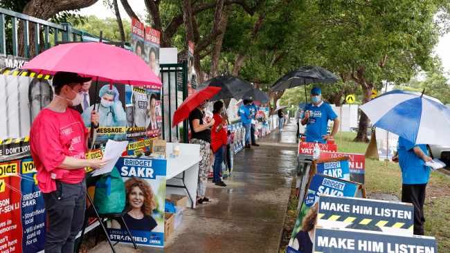 Thousands of residents across New South Wales have braced the rain to cast their votes in the Super Saturday by-elections. Picture: Tim Hunter.