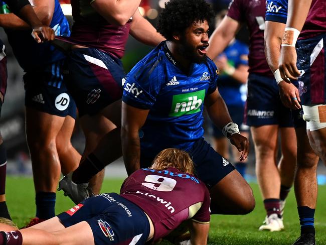 AUCKLAND, NEW ZEALAND - MAY 14: Soane Vikena of the Blues celebrates after scoring a try during the round 13 Super Rugby Pacific match between the Blues and the Queensland Reds at Eden Park on May 14, 2022 in Auckland, New Zealand. (Photo by Hannah Peters/Getty Images)