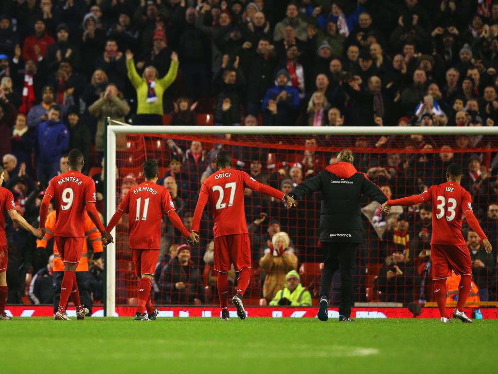 Klopp and his players salute The Kop after a draw against West Brom. (Photo by Alex Livesey/Getty Images)