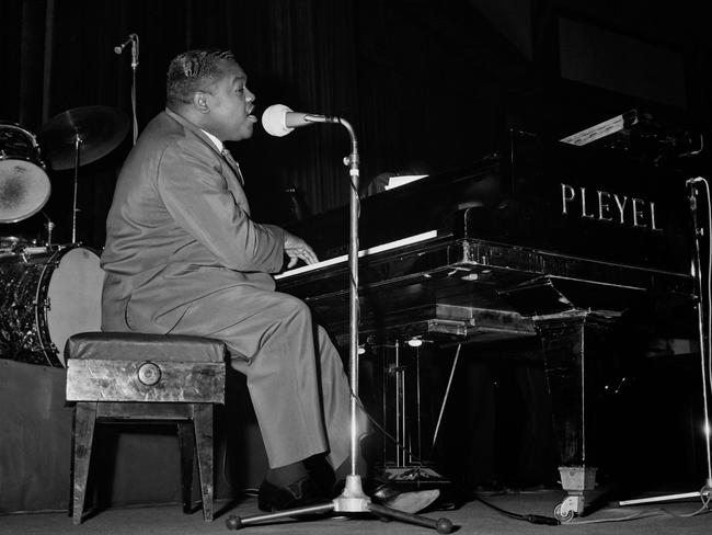 fats Domino at the piano at the Palais des Sports in Paris in 1962.