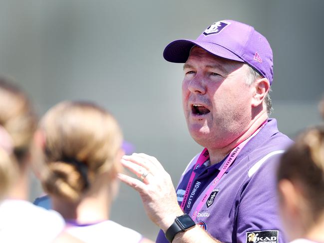 Former Fremantle coach Trent Cooper speaking in 2021. Picture: Sarah Reed/AFL Photos via Getty Images/