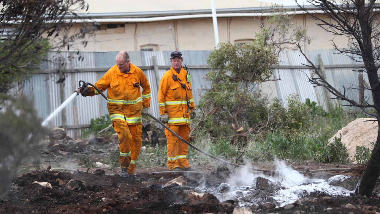 Crews mopping up on Tuesday. Picture: Tait Schmaal