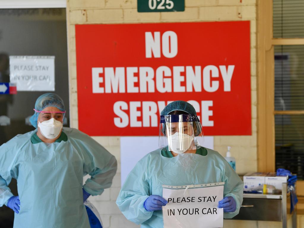 South Australia Hospital staff simulate a drive through coronavirus testing at the Repatriation Hospital in Adelaide. Picture: David Mariuz/AAP