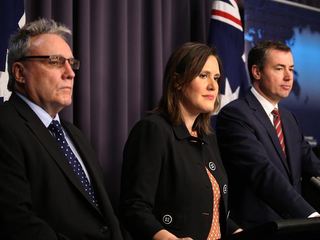 Michael Cranston as ATO Deputy Commissioner appearing alongside, Assistant Treasurer, Kelly ÕDwyer with Minister for Justice, Michael Keenan, during a press conference in Parliament House in Canberra.