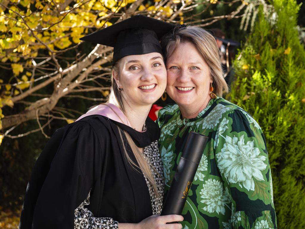 Bachelor of Education (Primary) graduate Courtney Sippel is congratulated by mum Debbie Walker at UniSQ graduation ceremony at Empire Theatres, Tuesday, June 27, 2023. Picture: Kevin Farmer