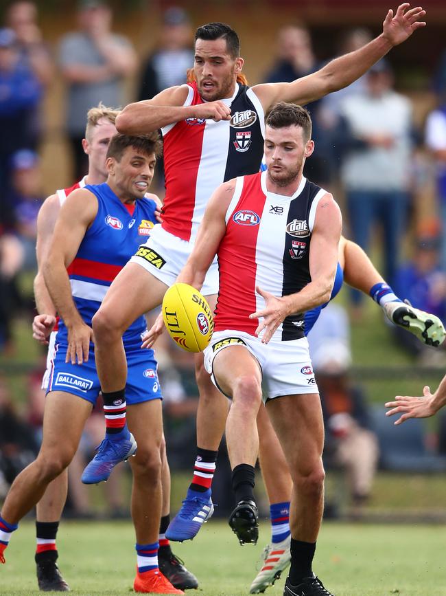 Saints Shane Savage and Dylan Roberton, front, in action against the Bulldogs.