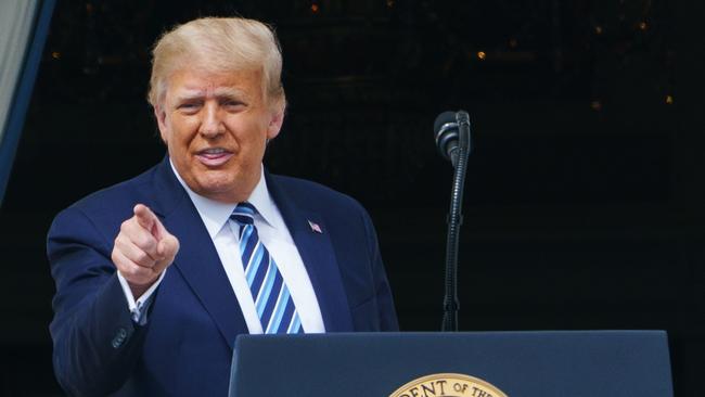 Donald Trump greets supporters after speaking about law and order from the South Portico of the White House. Picture: Mandel Cgan/AFP