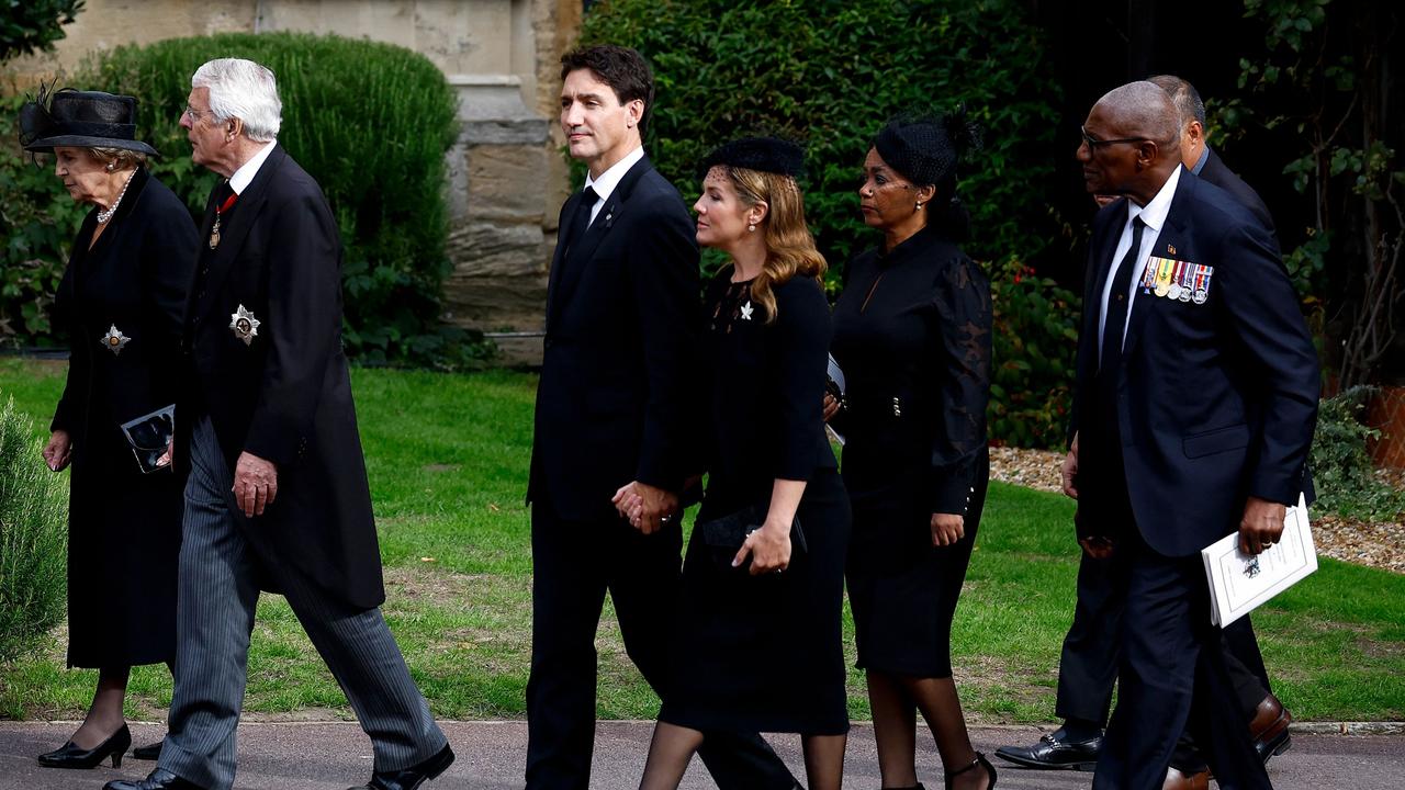 The Trudeaus arrive at the funeral with other guests, including former British Prime Minister John Major and his wife Norma Major. Picture: Jeff J Mitchell / Pool / AFP