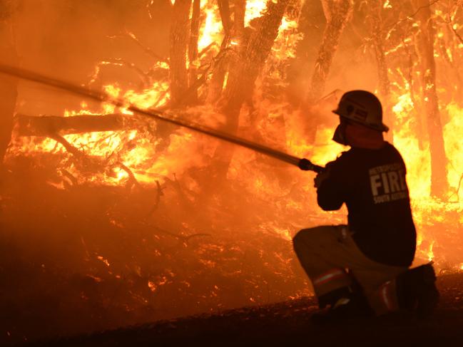 Fire at Kersbrook. MFS fire crew fight a fire on Wattle rd Kersbrook.   Picture Campbell Brodie.