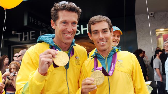 Malcolm Page (left) and Mathew Belcher with their 2012 London Olympic gold medals.
