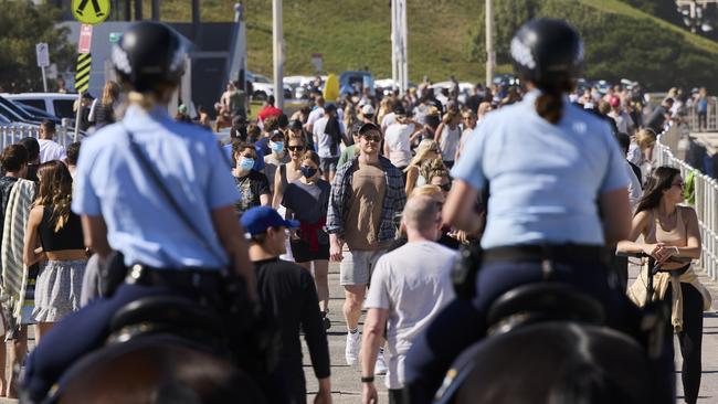 Mounted Police patrol at a busy Bondi Beach on Sunday. Picture: Getty Images