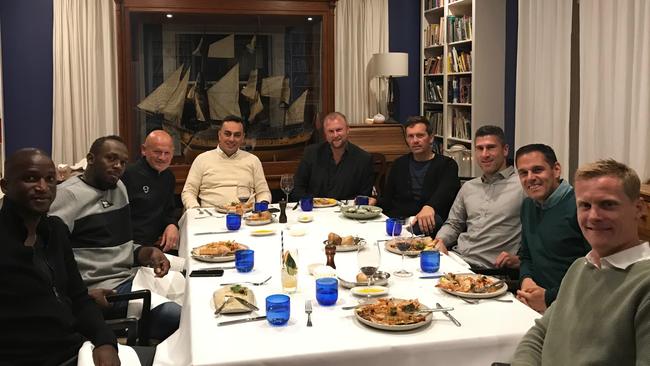 Central Coast Mariners captain Matt Simon (front) at Saturday night’s dinner with Usain Bolt. Pictured from left: Mariners player Kalifa Cisse, Usain Bolt, head of performance Andrew Young, agent Tony Rallis, Mariners CEO Sean Mielekamp, coach Mike Mulvey, assistant coach Nick Montgomery, Bolt’s manager Ricky Simms, and Simon.