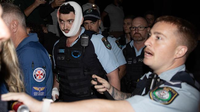 The wild scenes where a mob took part in a riot outside the Wakeley church where Bishop Mar Mari Emmanuel had been stabbed earlier. Picture: Liam Mendes