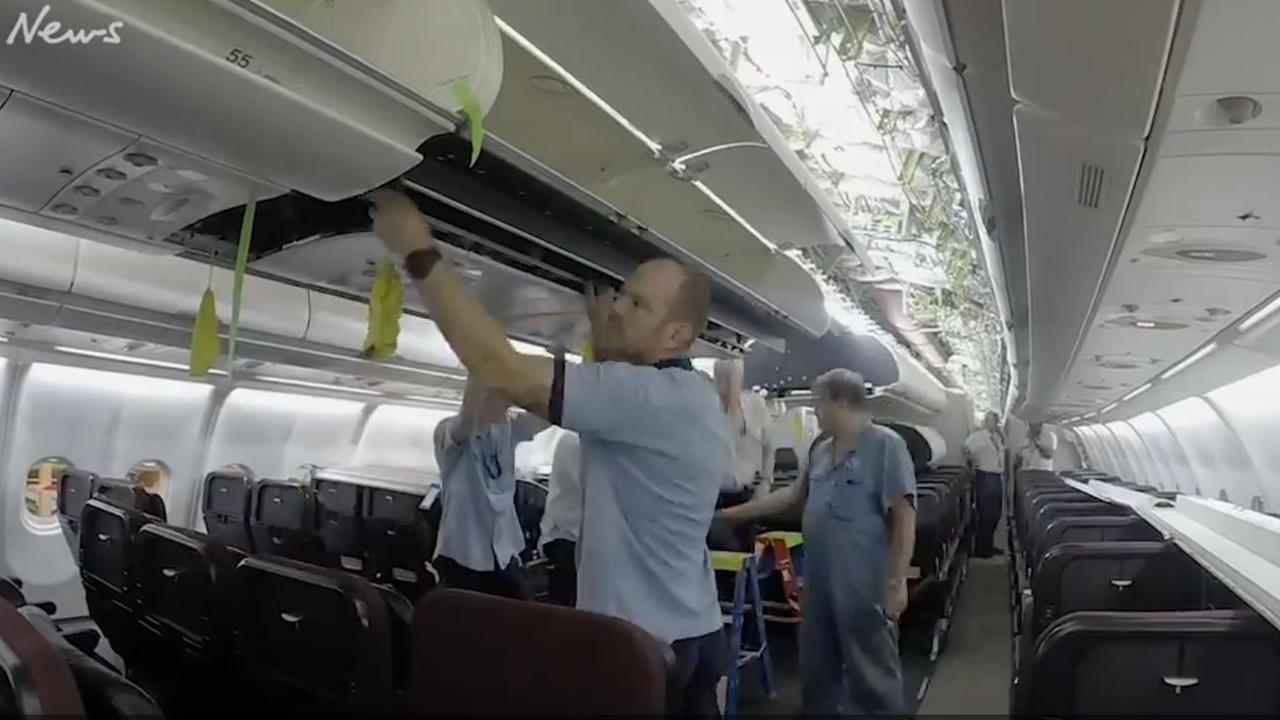 Work then continues inside the cabin. Picture: Qantas