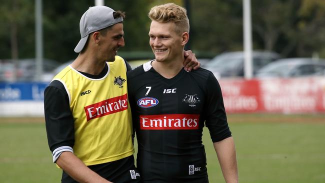 Scott Pendlebury and Adam Treloar. Picture: Wayne Ludbey