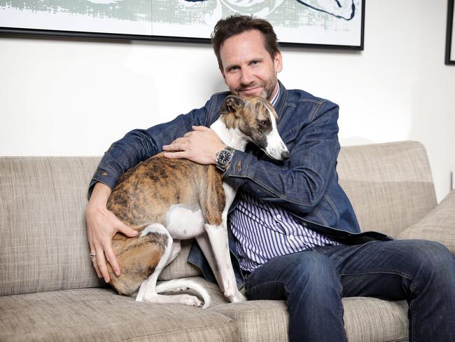 Pictured at home in Erskineville is Robbie Buck and his dog Billy. Picture: Christian Gilles