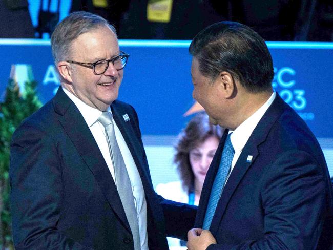 Prime Minister Anthony Albanese greets Chinese President Xi Jinping during the APEC Leaders Retreat. Picture: AFP