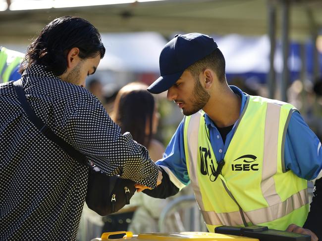 Punters going through security checks at Splendour in the Grass. Picture: AAP/Regi Varghese