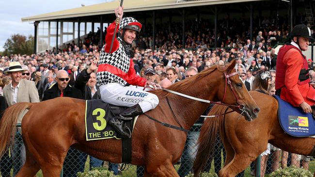 Brad Rawiller returns to scale aboard Akzar after winning the cup. Picture: Ian Currie
