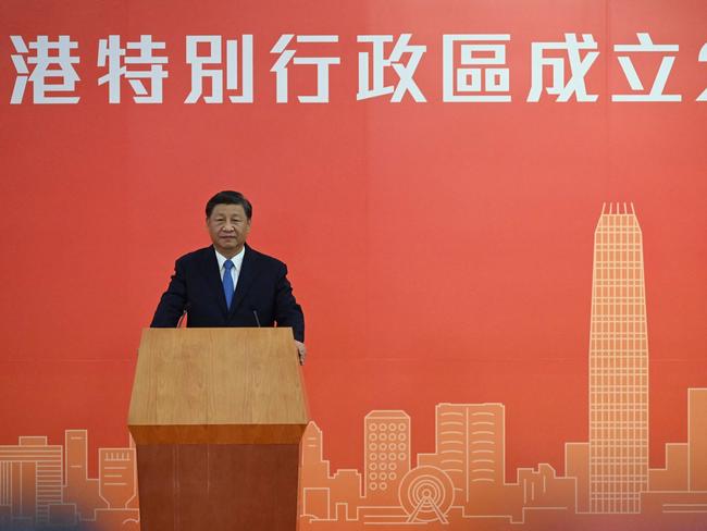 China's President Xi Jinping speaks following his arrival via high-speed rail across the border in Hong Kong on June 30, 2022, for celebrations marking the 25th anniversary of the city's handover from Britain to China. (Photo by Selim CHTAYTI / POOL / AFP)