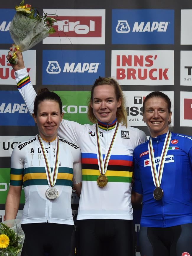 Silver medallist Amanda Spratt, winner Anna Van Der Breggen, from the Netherlands, and third placegetter Tatiana Guderzo, from Italy, after the Women's Elite road race. Picture: Christof STACHE / AFP