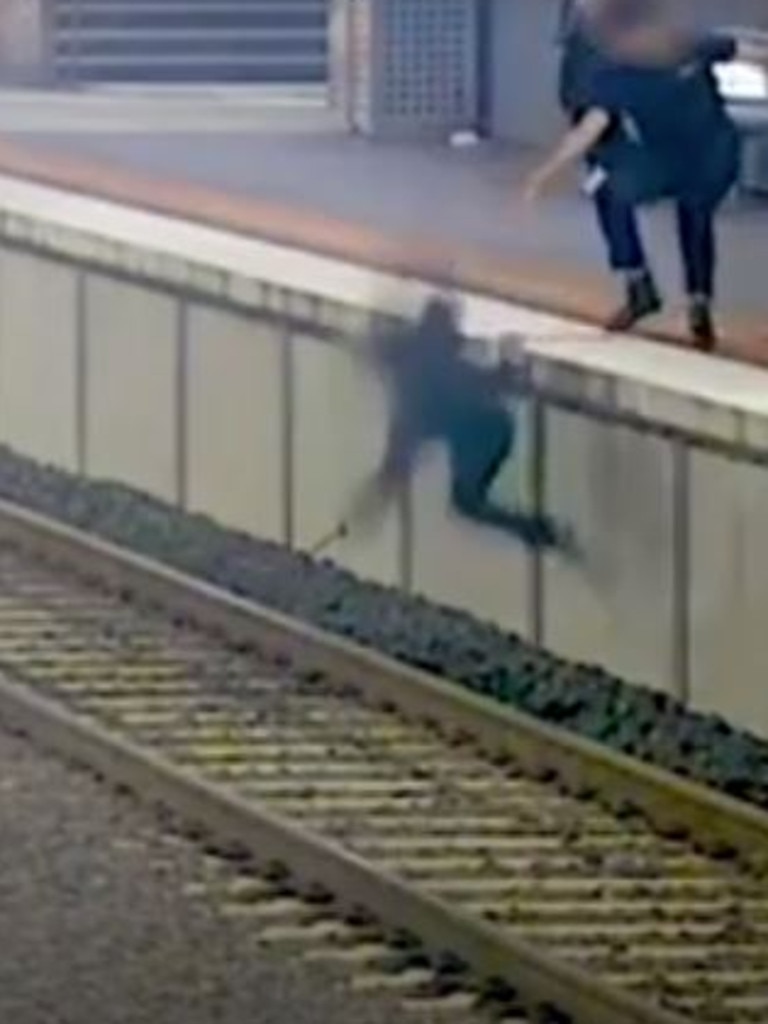 But he slips from the platform. Picture: Metro