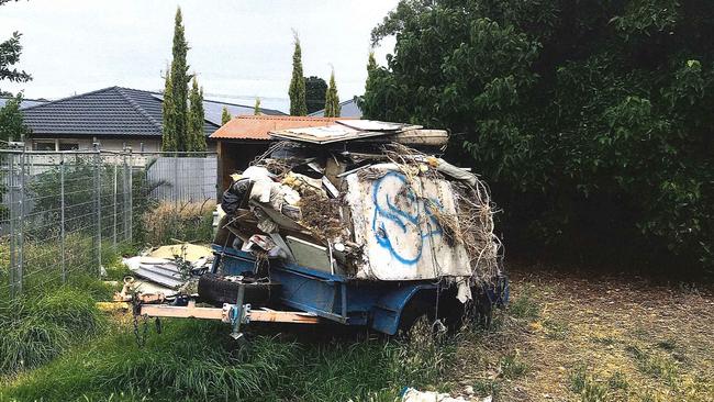 Hoarding at a Housing Trust property. Picture: Supplied.