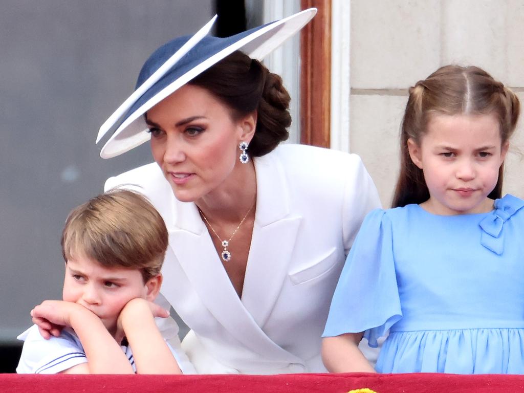 Kate Middleton has a word to Prince Louis and Princess Charlotte watches on. Picture: Getty Images