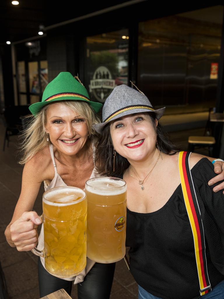 Lisa Howlett (left) and Araceli Castillo enjoy their steins at The Brewhouse as 4 Brothers Brewing and Konig's Biergarten Toowoomba join forces to celebrate Oktoberfest, Saturday, October 23, 2021. Picture: Kevin Farmer