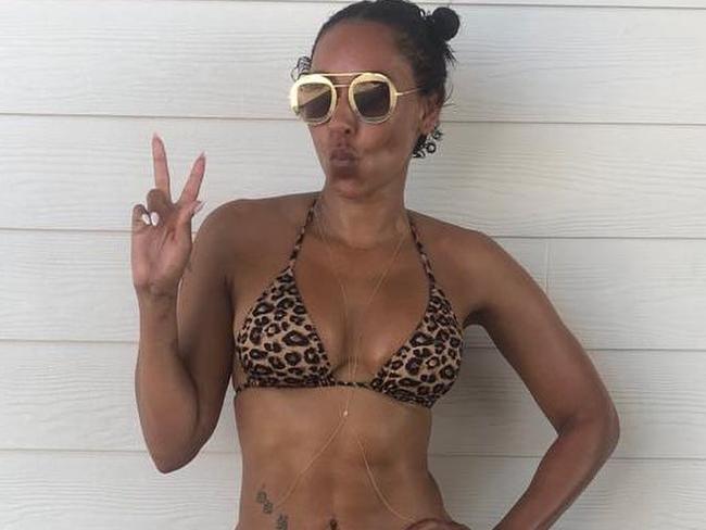 Mel B's bikini shot has been met with applaud - but there's a brutal struggle behind it.