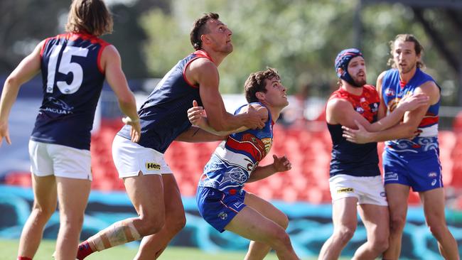 Talk about a mismatch … Braydon Preuss and Josh Dunkley contest the ruck. Picture: Michael Klein